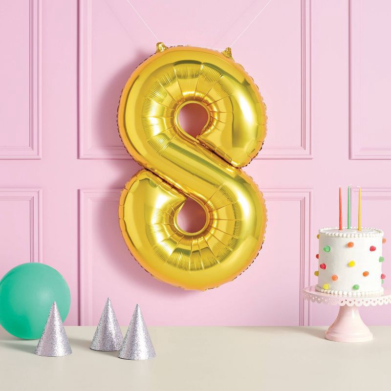 slide 2 of 4, 34" Number 8 Foil Balloon - Spritz™: Gold Birthday Decoration, Solid Pattern, All Ages, 1 ct
