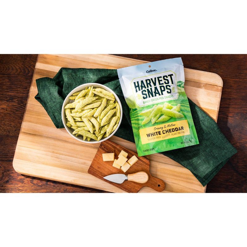 slide 3 of 5, Harvest Snaps White Cheddar Baked Green Pea Snacks - 3oz, 3 oz