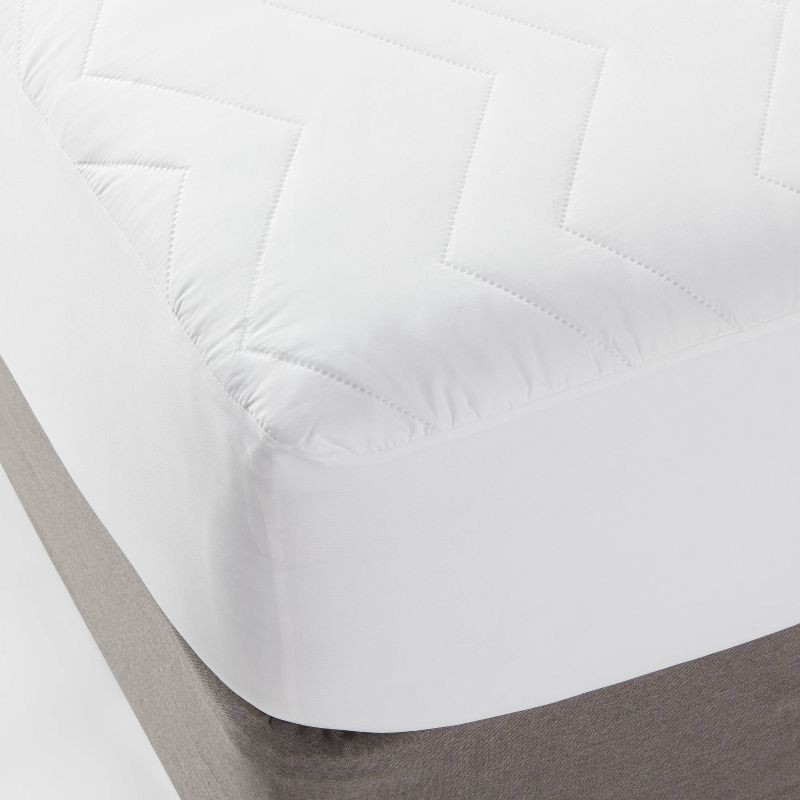 slide 1 of 3, King Machine Washable Quilted Mattress Pad - Room Essentials™, 1 ct