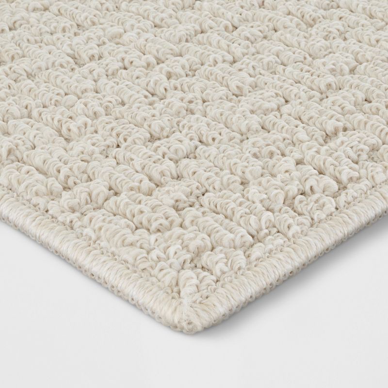 slide 2 of 3, 2'6"x3'10" Washable Solid Machine Tufted Accent Rug Tan - Threshold™: Skid-Resistant Indoor Low Pile Carpet, 1 ct