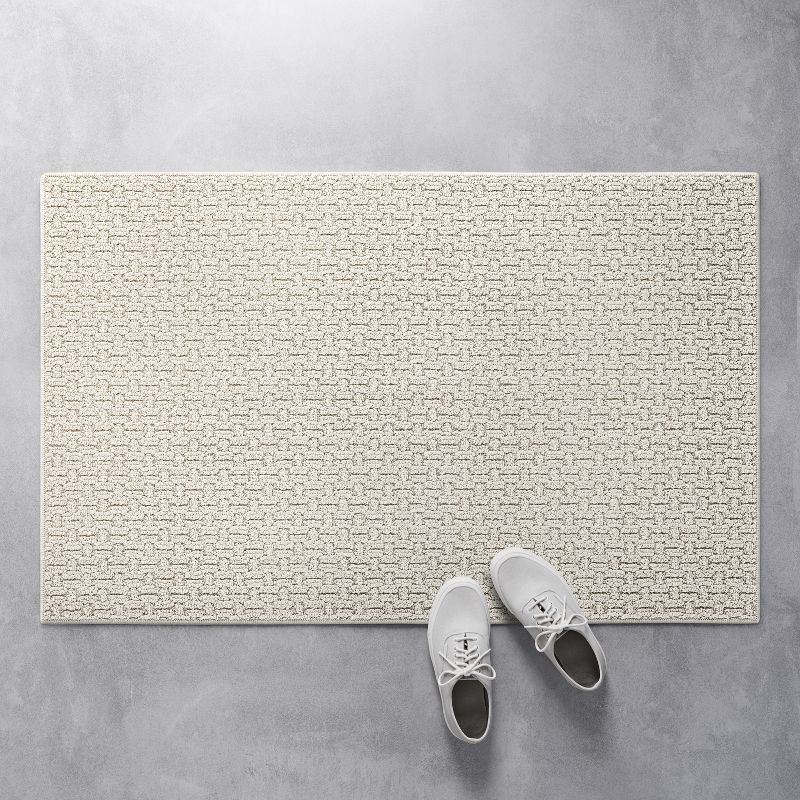 slide 3 of 3, 2'6"x3'10" Washable Solid Machine Tufted Accent Rug Tan - Threshold™: Skid-Resistant Indoor Low Pile Carpet, 1 ct
