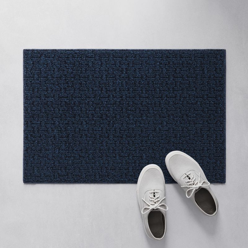 slide 3 of 3, 1'8"X2'6" Washable Solid Machine Tufted Accent Rug Blue - Threshold™, 1 ct