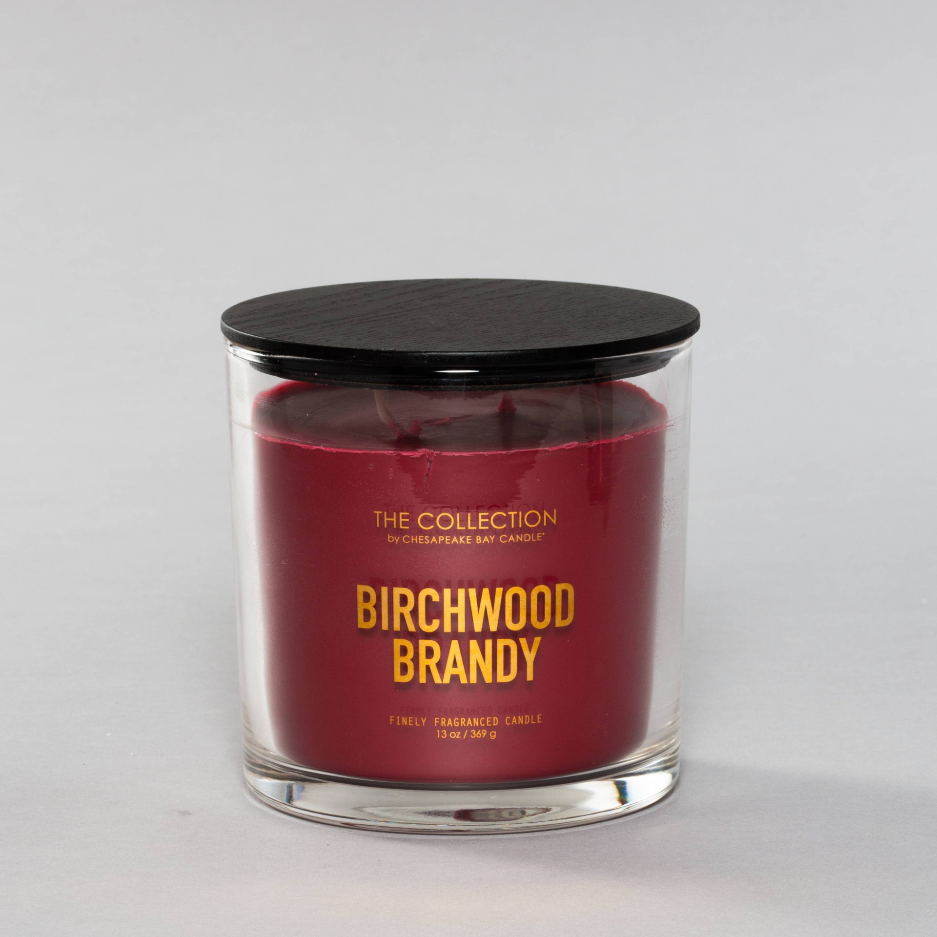 slide 1 of 2, Chesapeake Bay Candle Clear Jar 2-Wick Candle - Birchwood Brandy, 13 oz