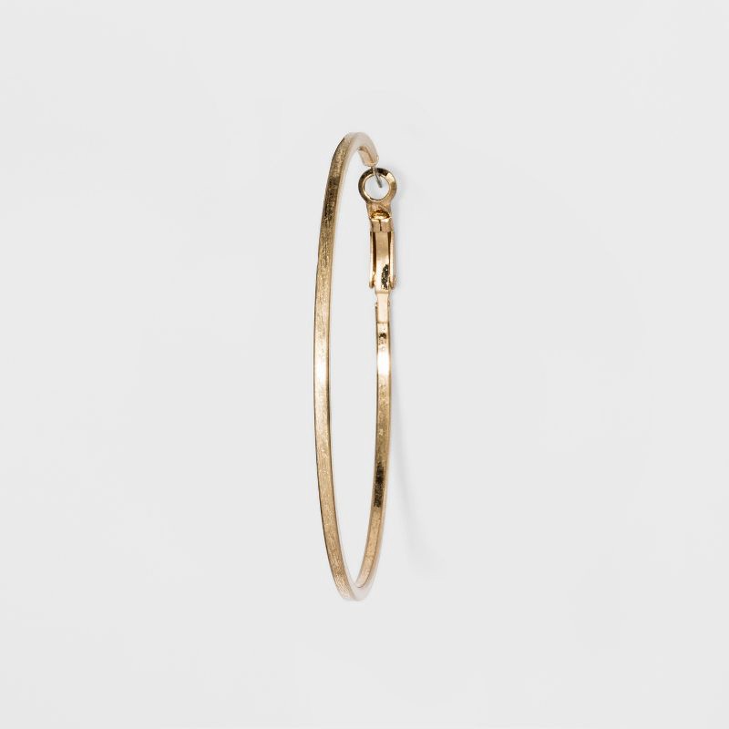 slide 2 of 3, Thick Circle Hoop Earrings - Universal Thread™ Gold, 1 ct