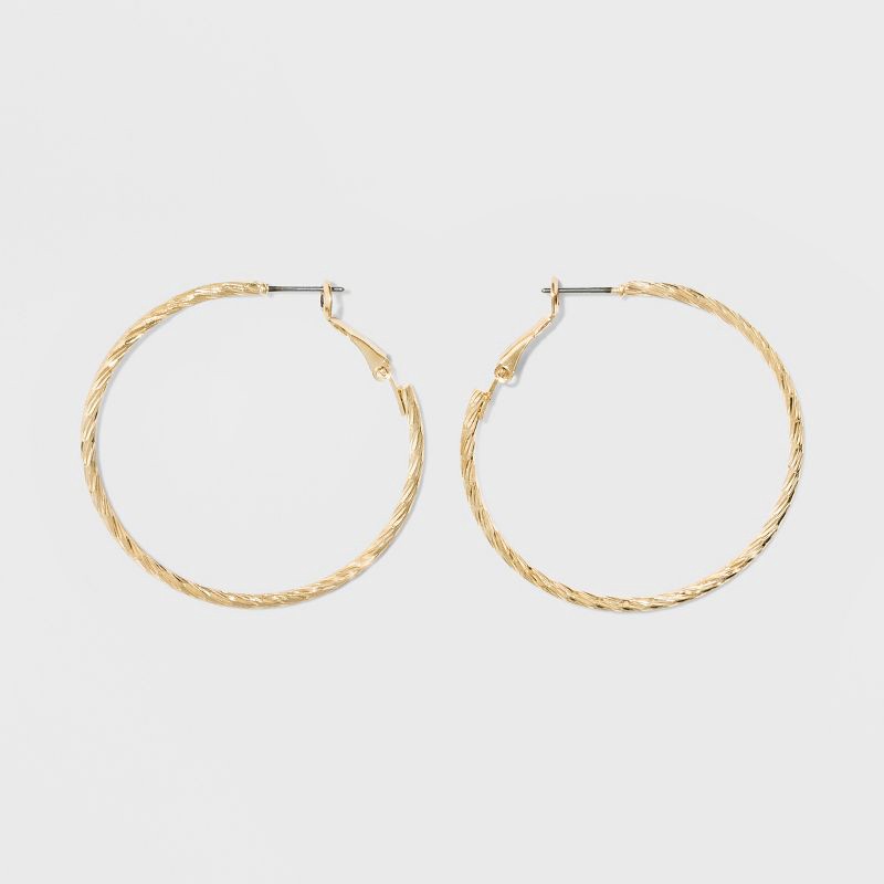 slide 2 of 3, Textured Hoop Earrings - A New Day™ Gold: Leverback, Nickel-Free Metal, 1.75" Diameter, 1 ct