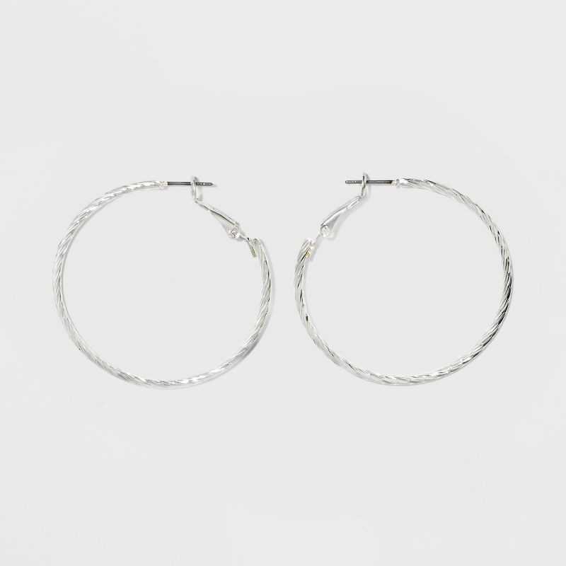 slide 2 of 3, Textured Hoop Earrings - A New Day™ Silver: Leverback Closure, Nickel-Free Metal, 1.75" Diameter, Lightweight Jewelry, 1 ct