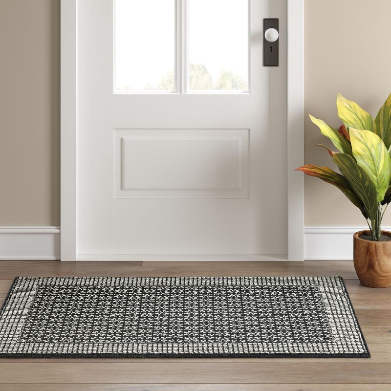 slide 3 of 3, 2'6"x3'10" Washable Geometric Border Tufted Accent Rug Black - Threshold™, 1 ct