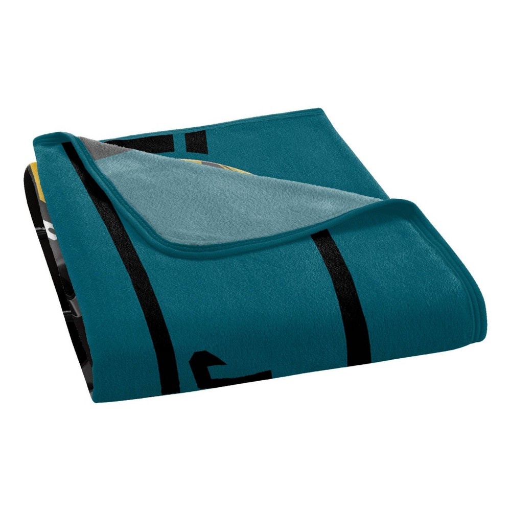 slide 2 of 4, NFL Jacksonville Jaguars Micro Fleece Throw Blanket, 1 ct