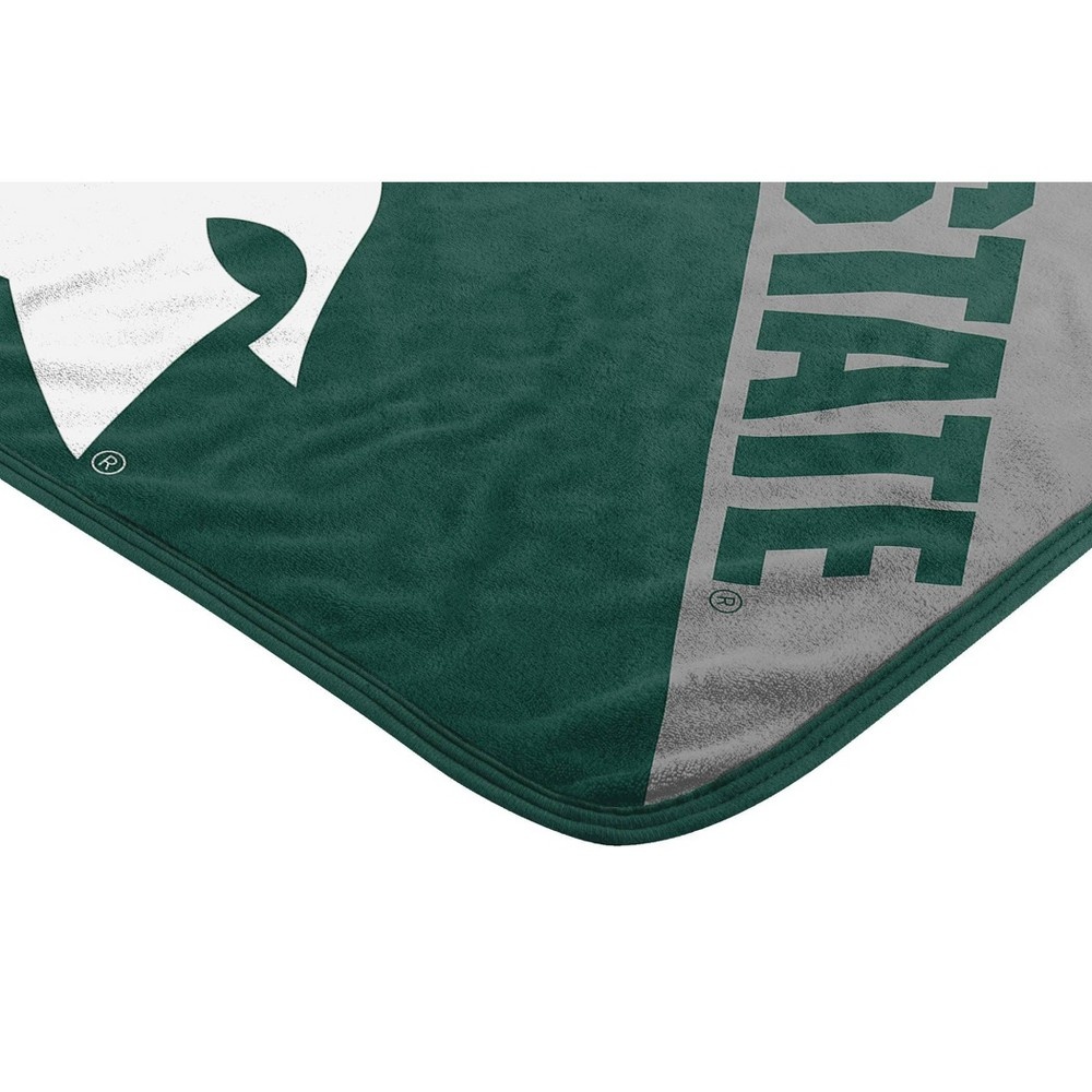 slide 3 of 4, NCAA Michigan State Spartans Micro Fleece Throw Blanket, 1 ct