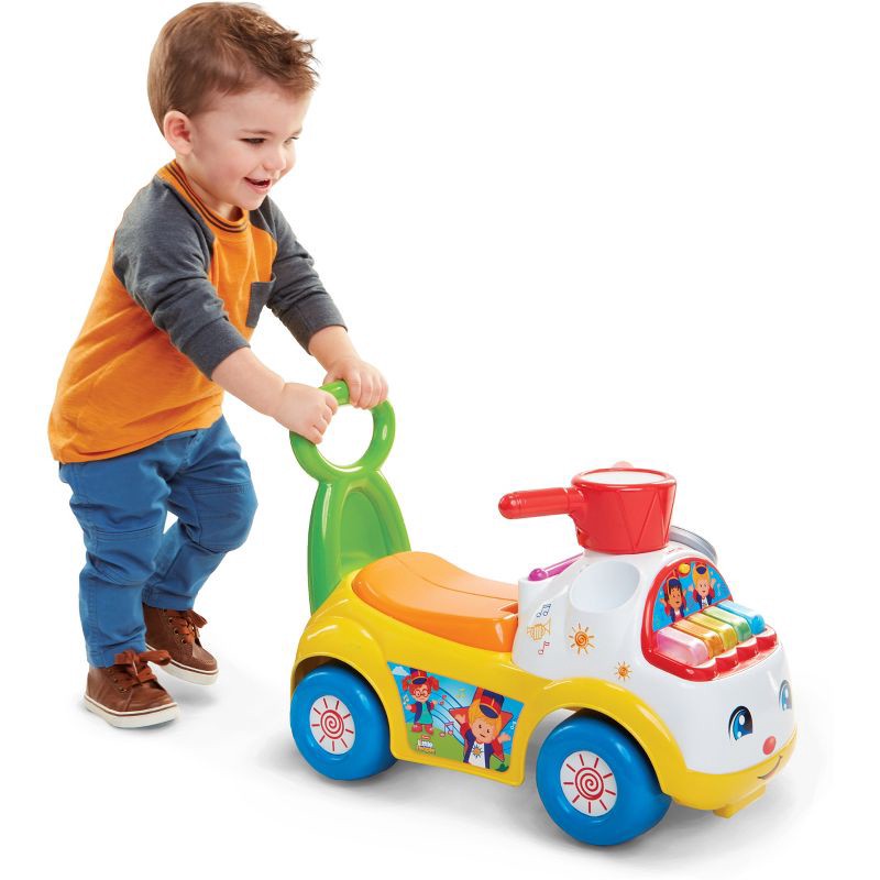 slide 3 of 8, Fisher-Price Little People Music Parade Ride-On with Lights, Sounds, Storage and Walking Bar - Yellow, 1 ct