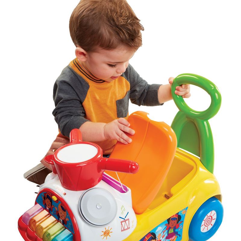 slide 6 of 8, Fisher-Price Little People Music Parade Ride-On with Lights, Sounds, Storage and Walking Bar - Yellow, 1 ct