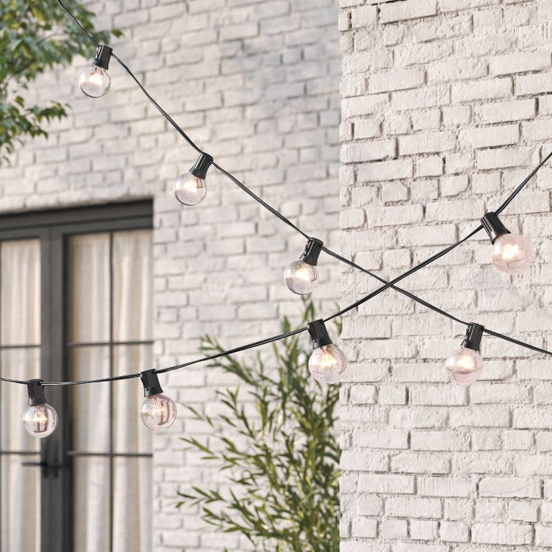 slide 2 of 4, 20ct Incandescent Outdoor String Lights G40 Clear Bulbs - Black Wire - Room Essentials™: UL Listed, Indoor/Outdoor Use, 20 ct