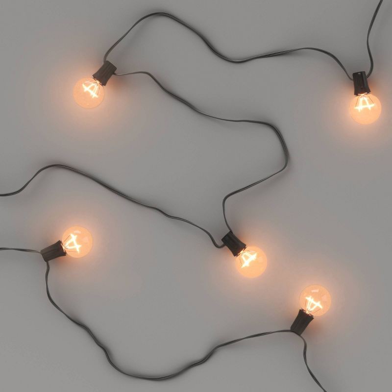 slide 3 of 4, 20ct Incandescent Outdoor String Lights G40 Clear Bulbs - Black Wire - Room Essentials™: UL Listed, Indoor/Outdoor Use, 20 ct