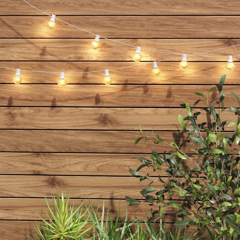 slide 2 of 4, 20ct Incandescent Outdoor String Lights G40 Clear Bulbs - White Wire - Room Essentials™: UL Listed, Indoor/Outdoor Use, 20 ct