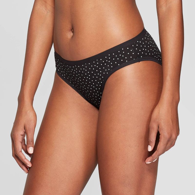 slide 1 of 2, Women's Star Print Cotton Blend Bikini Underwear - Auden™ Black L: Mid Rise, Elastic Waistband, Knit Jersey Fabric, 1 ct