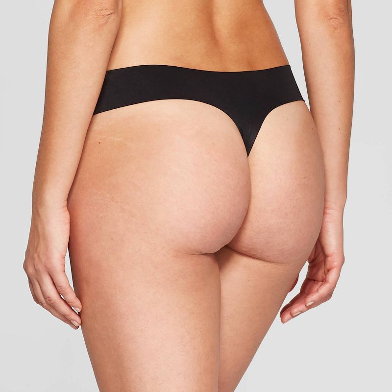 slide 2 of 2, Women's Invisible Edge Thong Underwear - Auden™ Black S: Seamless, Low Rise, Lightweight Fabric, 1 ct