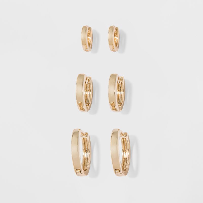slide 1 of 3, Small Hoop Earring Set 3pc - A New Day™ Gold: Brass Nickel-Free Metal, Hinge Closure, 16+ Age, 0.58" Length, 0.62" Width, 3 ct
