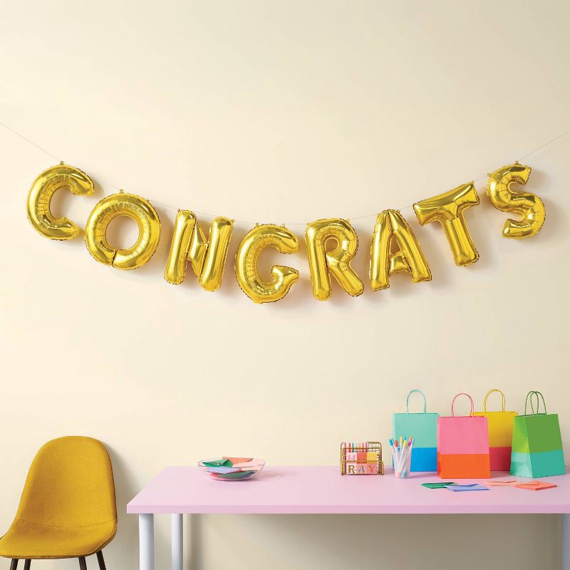slide 2 of 4, "Congrats" Script Foil Balloon Banner Gold - Spritz™, 1 ct