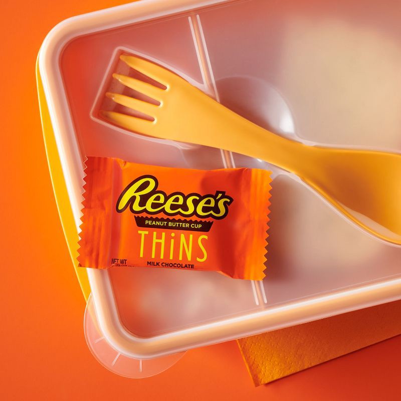 slide 6 of 7, Reese's Peanut Butter Cups Thins Milk Chocolate Candy Pouch - 7.37oz, 7.37 oz