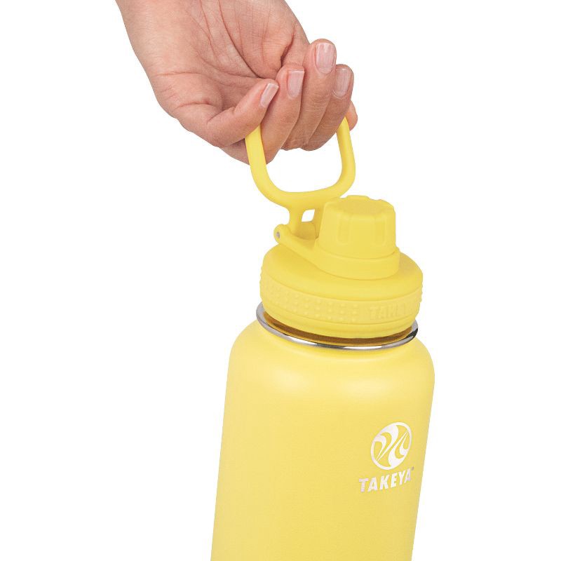 slide 2 of 5, Takeya 32oz Actives Insulated Stainless Steel Water Bottle with Spout Lid - Light Yellow, 1 ct