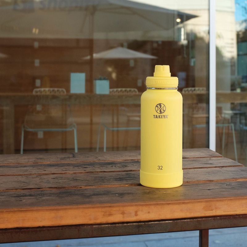 slide 4 of 5, Takeya 32oz Actives Insulated Stainless Steel Water Bottle with Spout Lid - Light Yellow, 1 ct