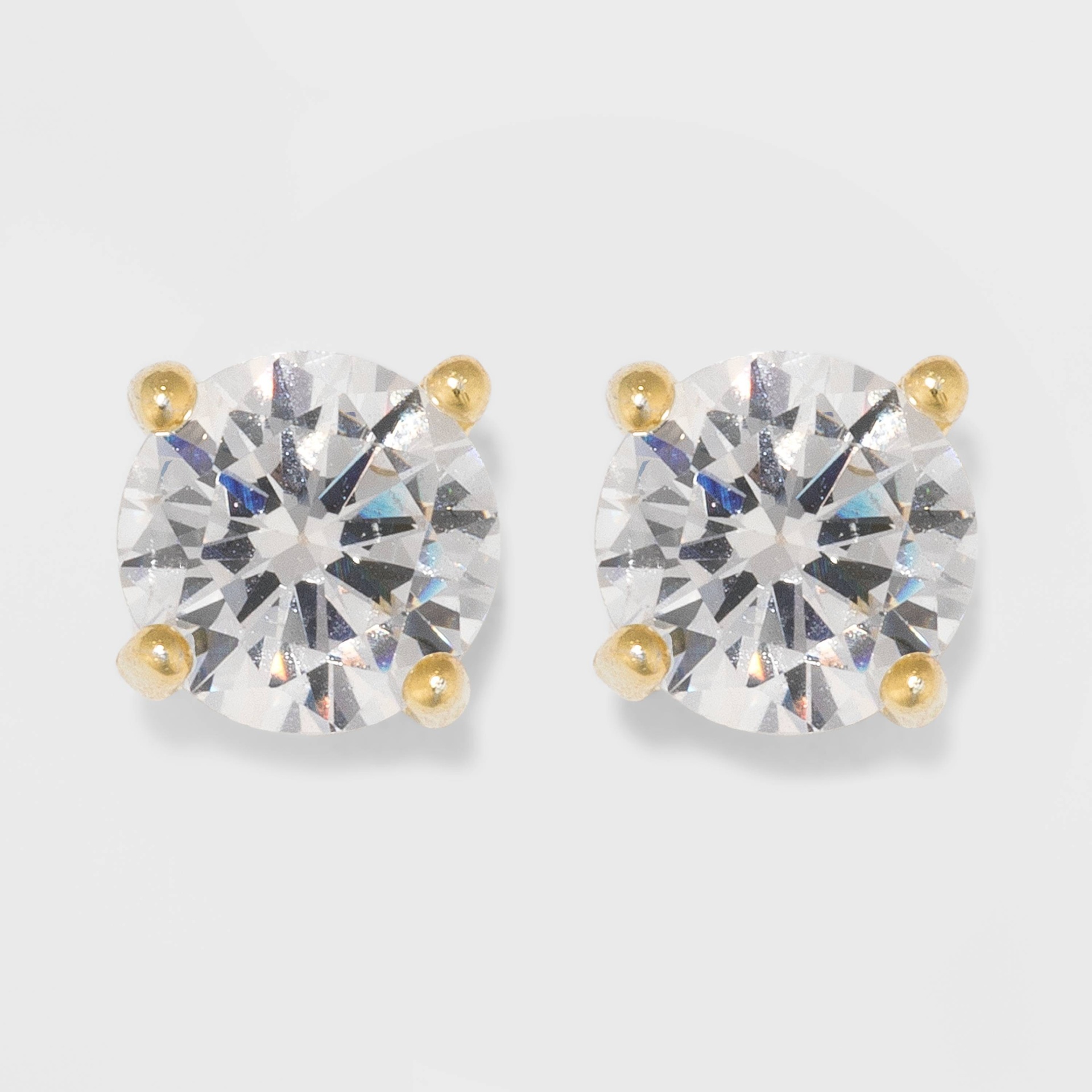 slide 1 of 3, Gold Over Sterling Silver Small Round Cubic Zirconia Stud Earrings - A New Day Gold/Clear, 1 ct