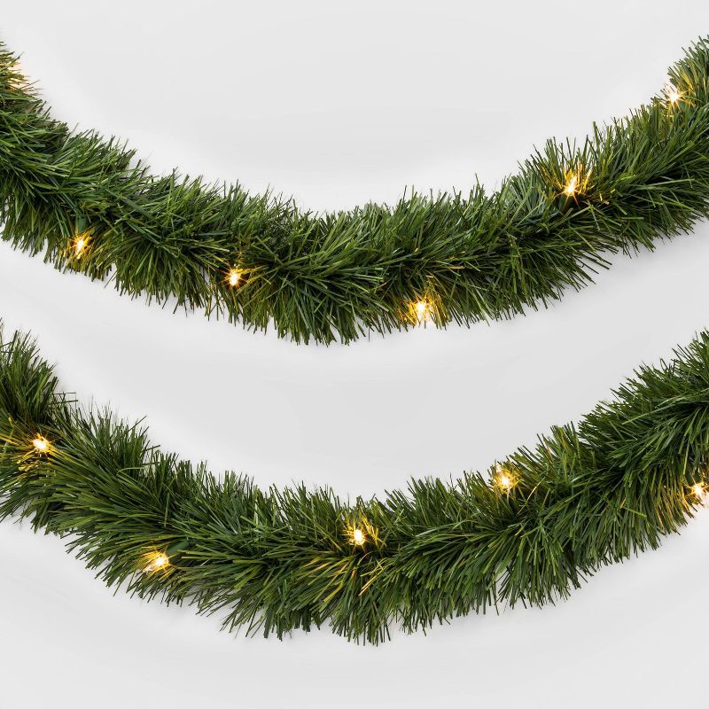 slide 1 of 3, 18' Pre-Lit Artificial Pine Christmas Garland with Clear Lights - Wondershop™: Indoor/Outdoor Use, Wall/Door Decor, 1 ct