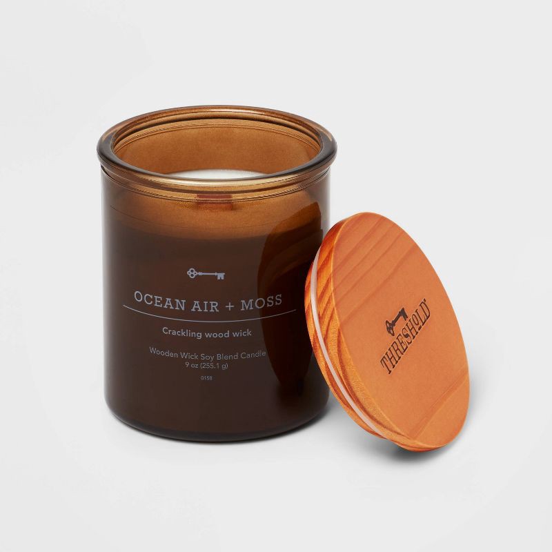 slide 2 of 3, Amber Glass Ocean Air and Moss Lidded Wooden Wick Jar Candle 9oz - Threshold™, 9 oz