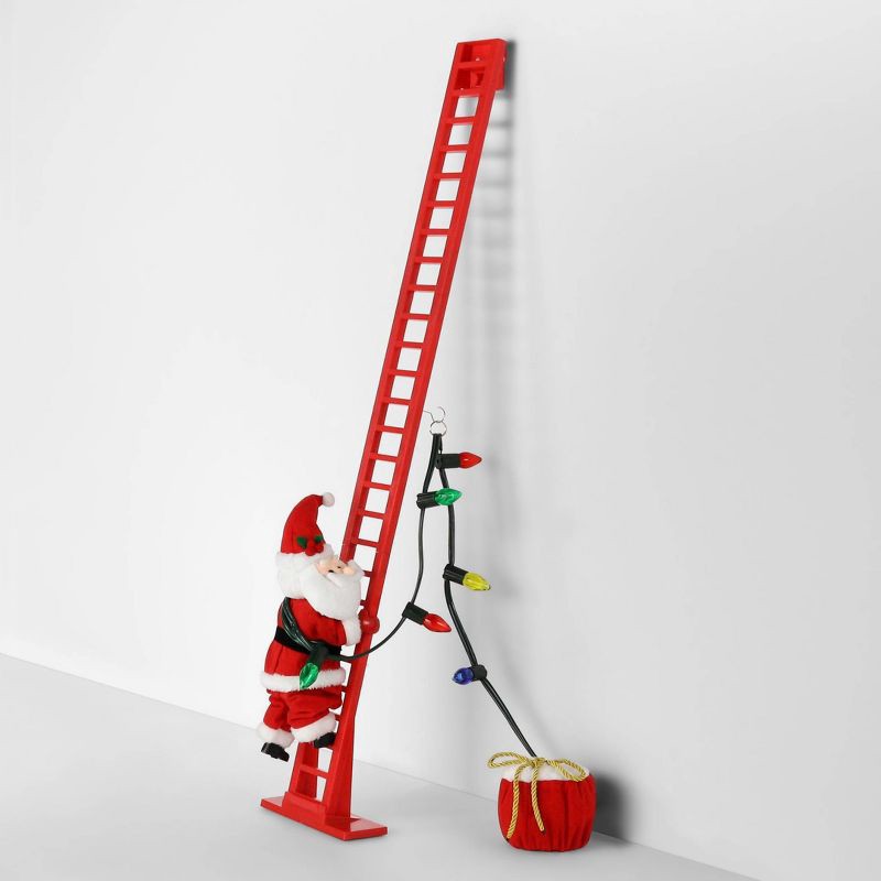 slide 2 of 4, Large Climbing Santa Decorative Christmas Figurine Red - Wondershop™: Animated, Musical, Indoor Display, 1 ct