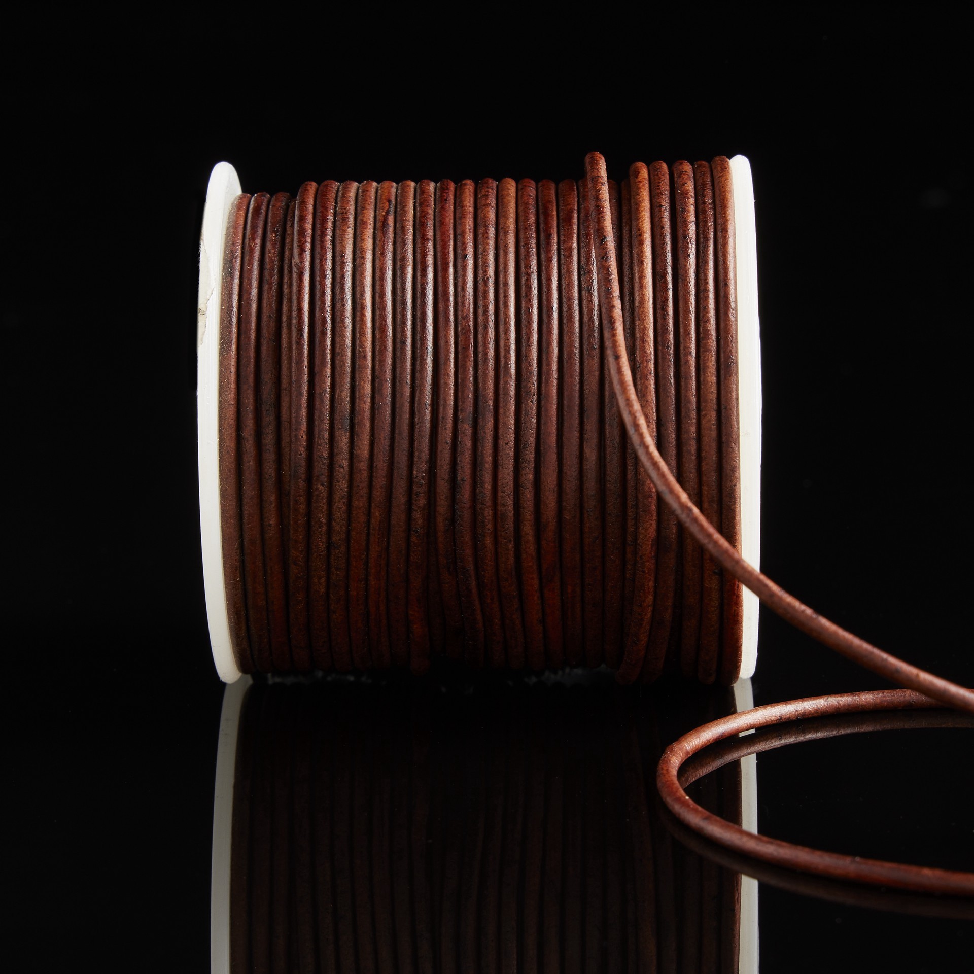 slide 2 of 5, Mahogany Round Leather Cord By Bead Landing, 2mm x 25 yd