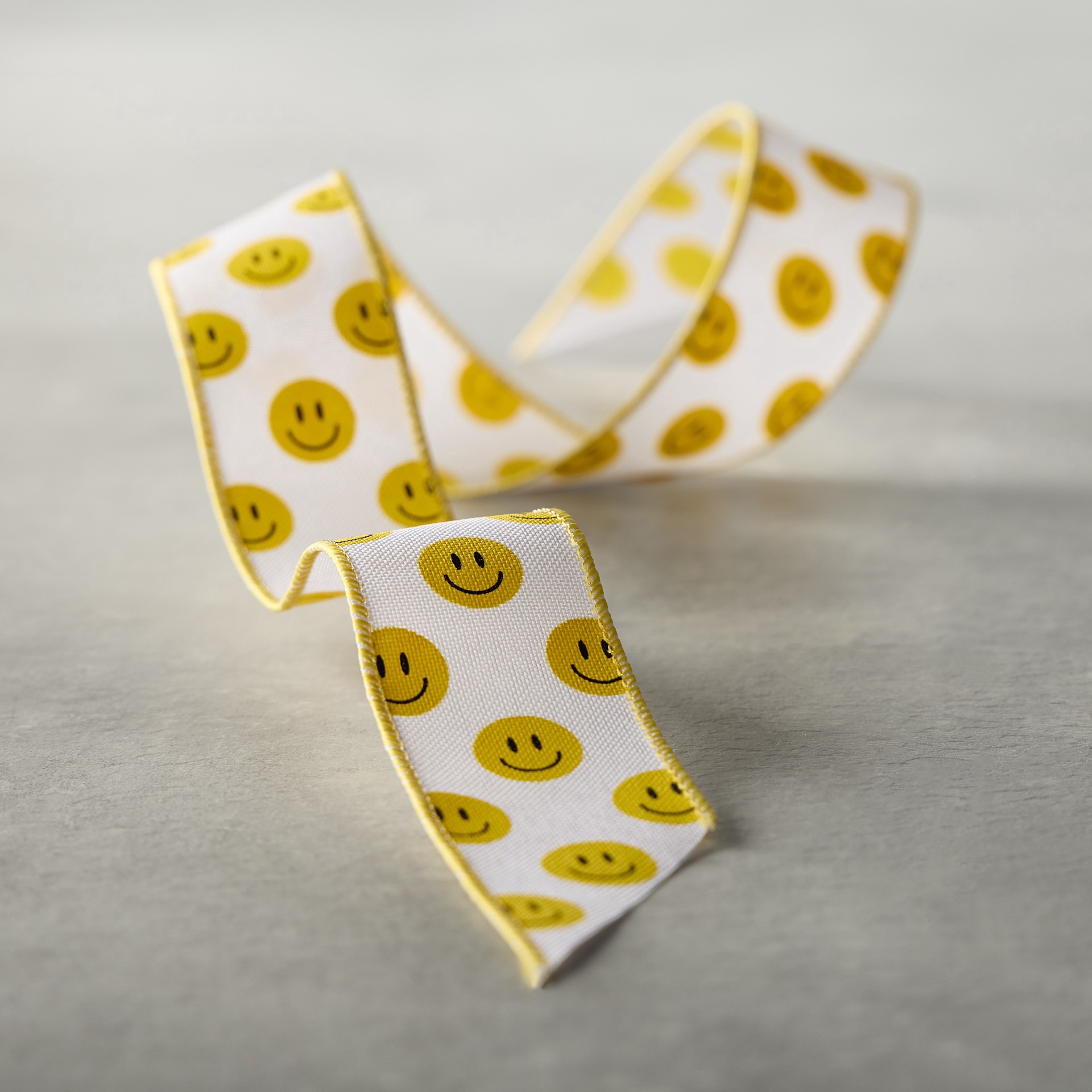 slide 2 of 2, 1.5" X 3yd. Wired Yellow Smiley Face Ribbon By Celebrate It Classic, 1.5 in x 3 yd