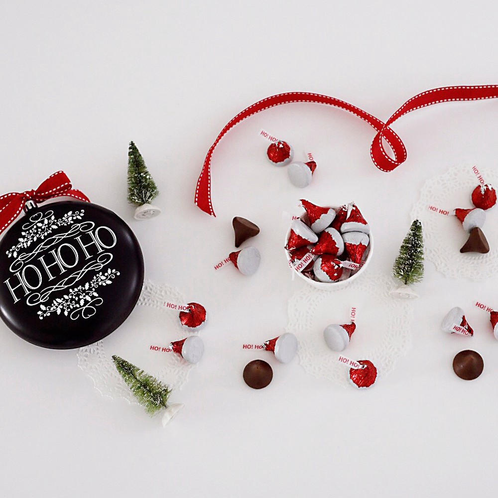 slide 3 of 5, Kisses Holiday Milk Chocolates In Santa Hat Foils, 11 oz