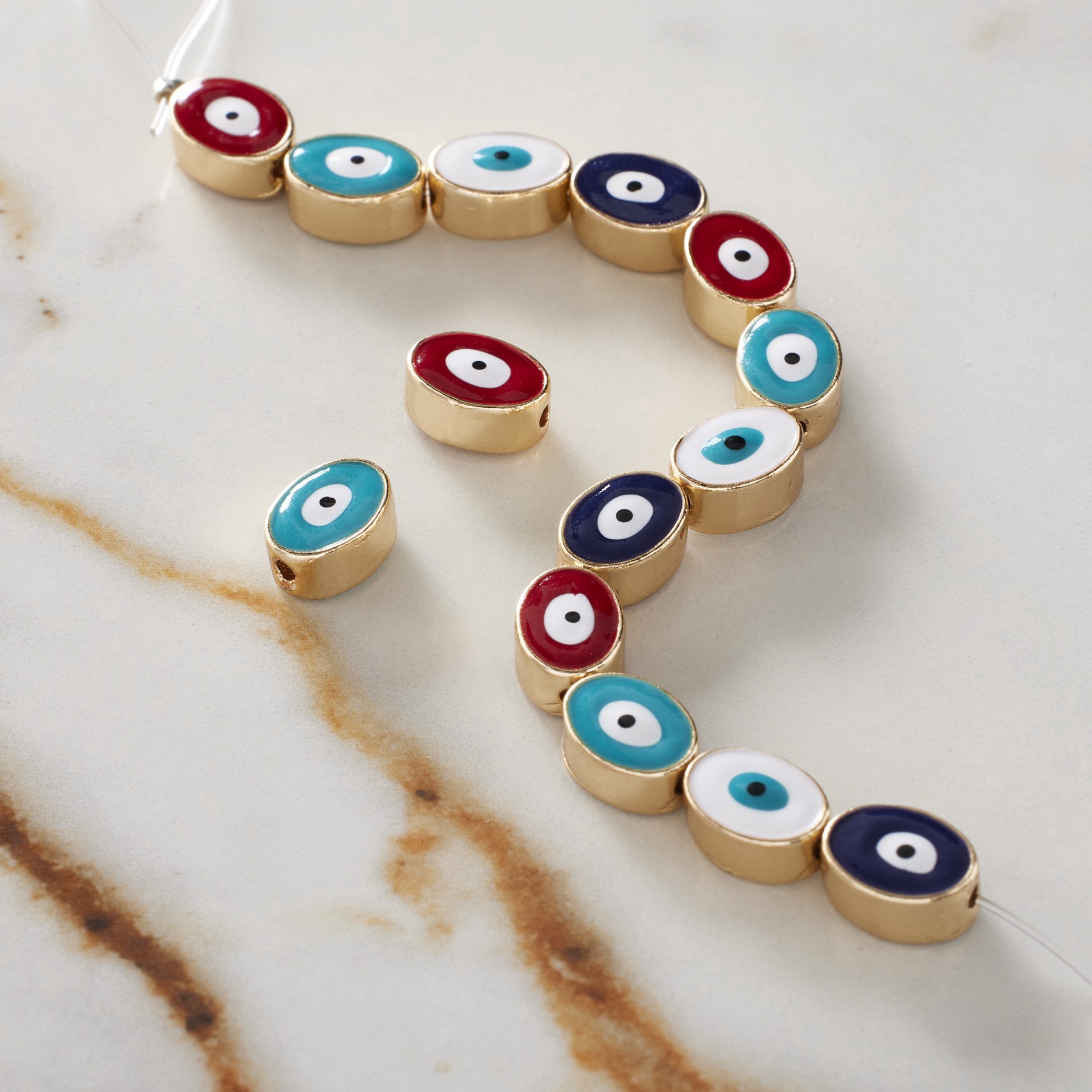 slide 3 of 3, Multicolor & Gold Evil Eye Oval Beads, 9mm By Bead Landing, 9 mm