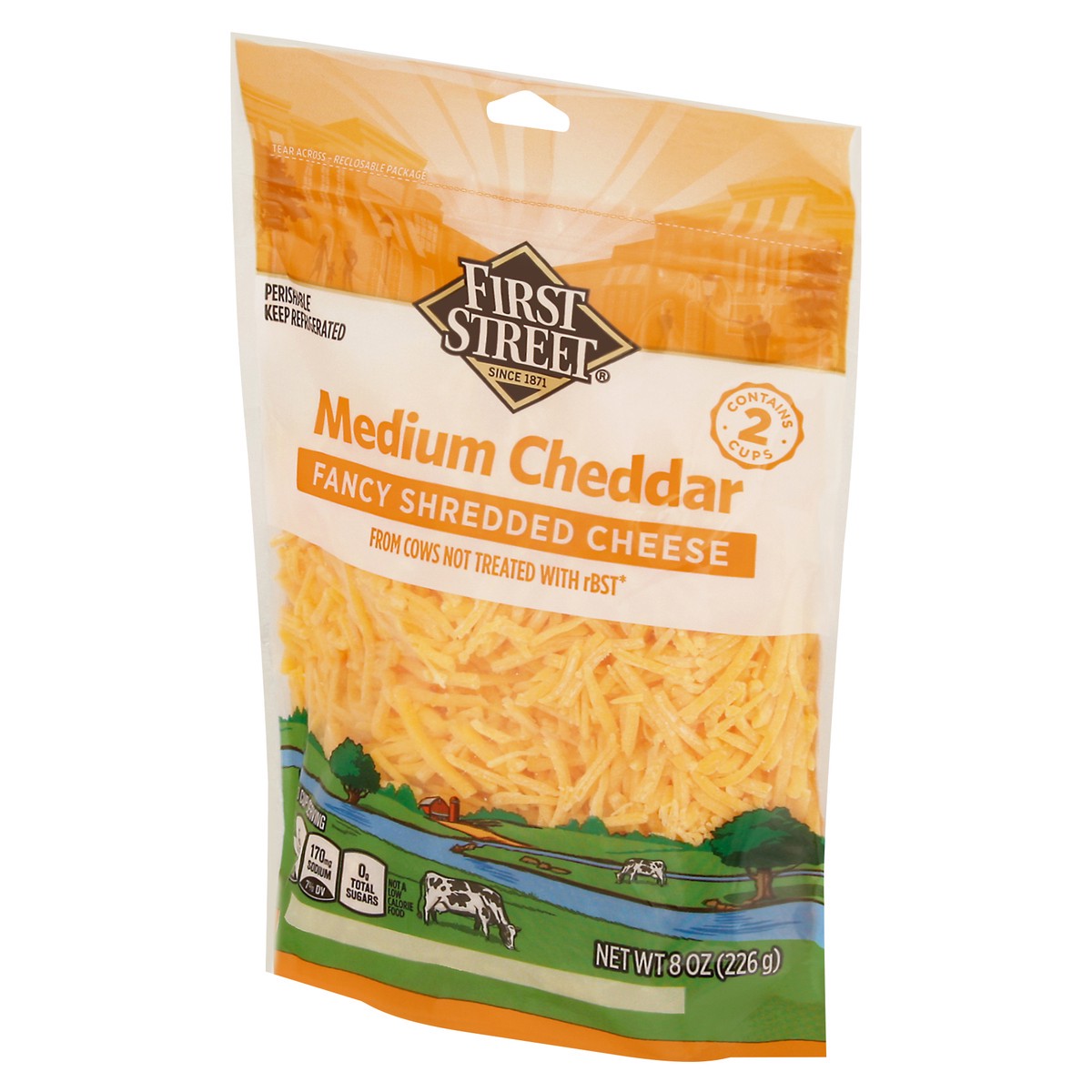slide 7 of 13, First Street Medium Cheddar Fancy Shred, 8 oz