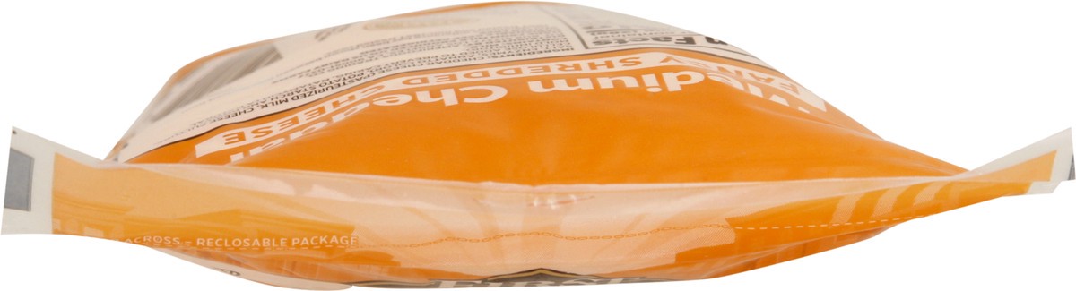 slide 11 of 13, First Street Medium Cheddar Fancy Shred, 8 oz