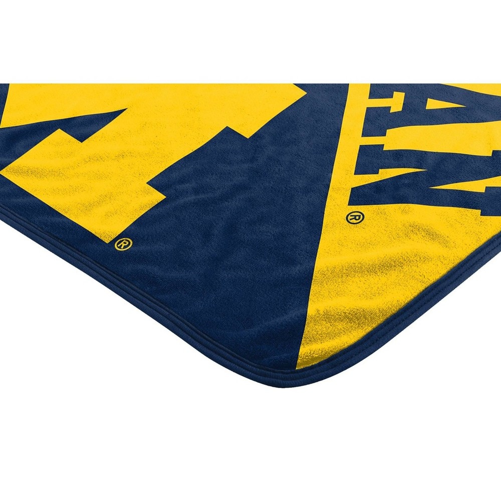 slide 4 of 4, NCAA Michigan Wolverines Micro Fleece Throw Blanket, 1 ct