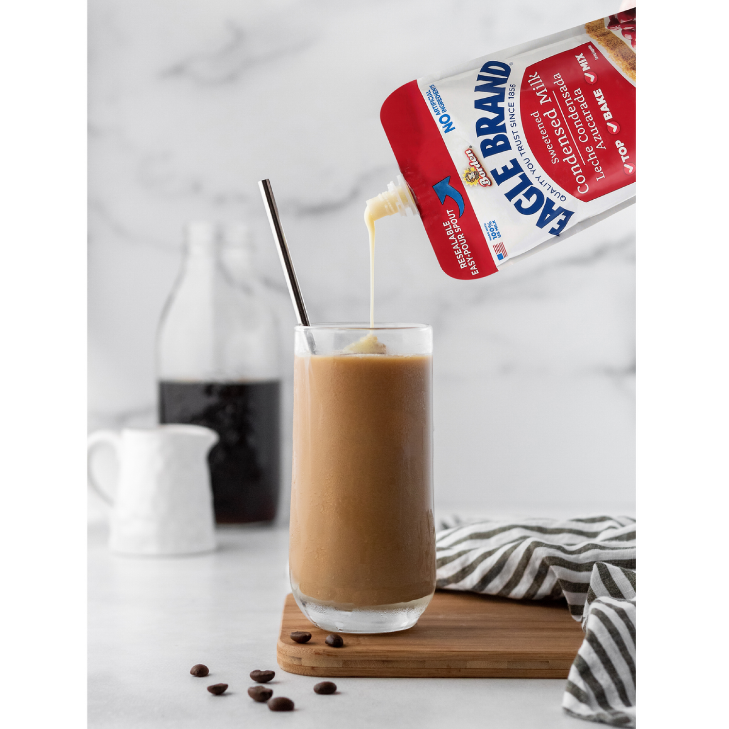 slide 3 of 8, Eagle Brand Sweetened Condensed Milk Pouch, 14 oz