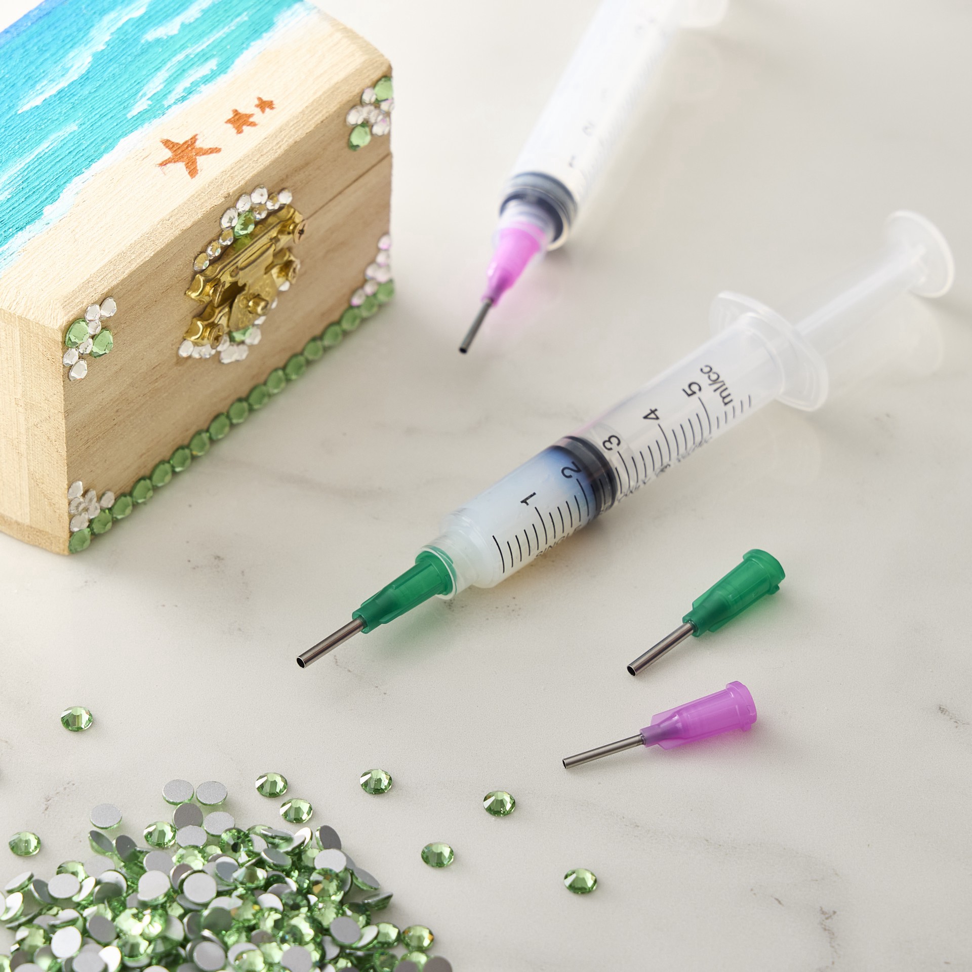 slide 4 of 5, The Beadsmith Crystal Fx Thick Viscosity Glue Syringe & Tip Set, 1 ct