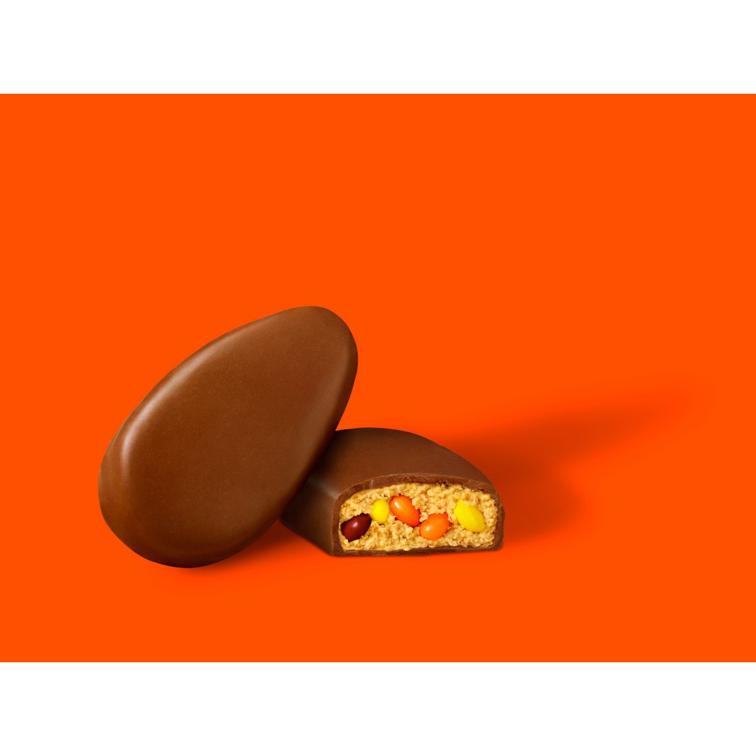 slide 2 of 4, Reese's STUFFED WITH PIECES Milk Chocolate Peanut Butter Egg Candy, 1.1 oz, Packs (24 Count), 1.1 oz