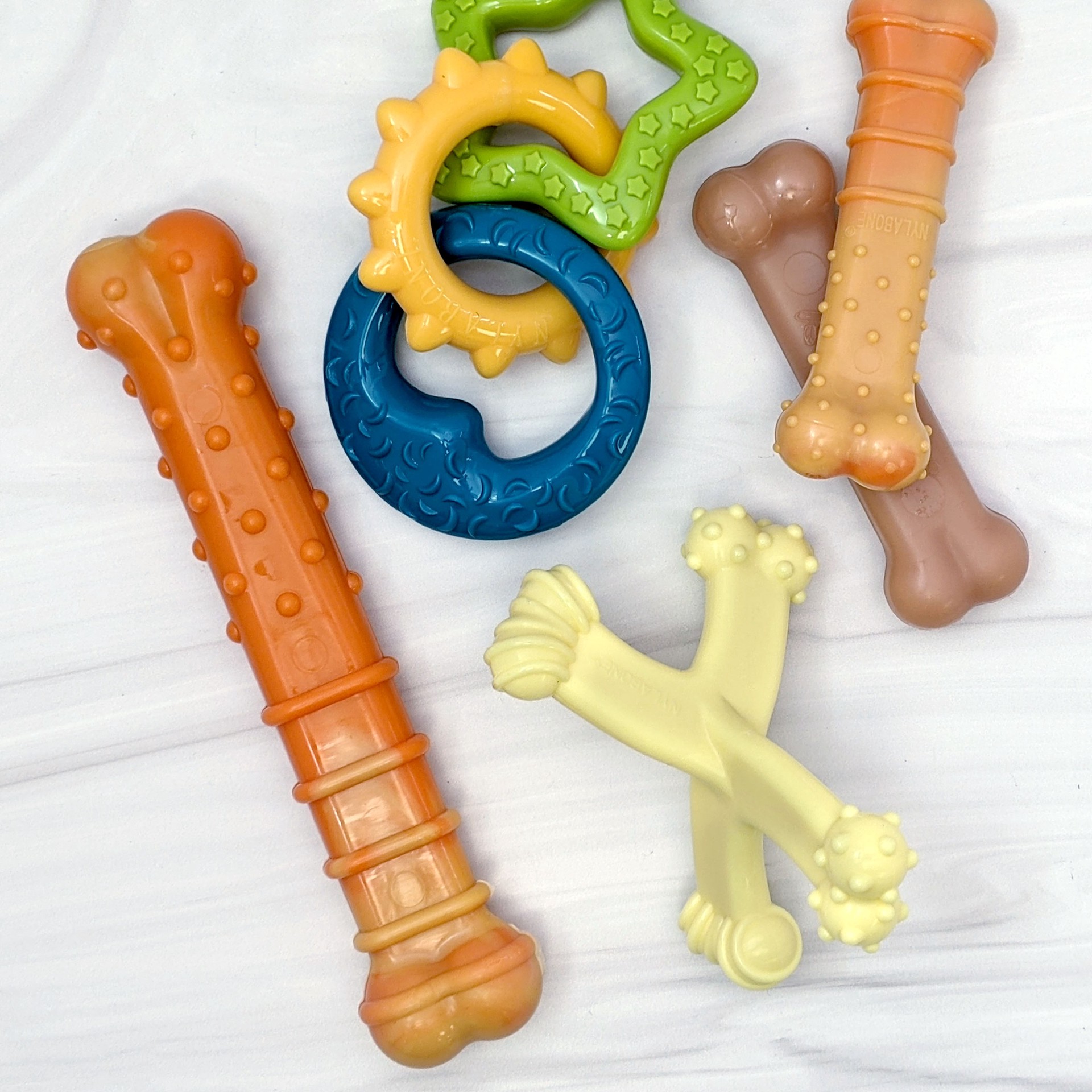 slide 3 of 10, Nylabone Axis Bone Nylon Puppy Chew Toy Small/Regular - Up to 25 Ibs.(1 Count), 1 ct