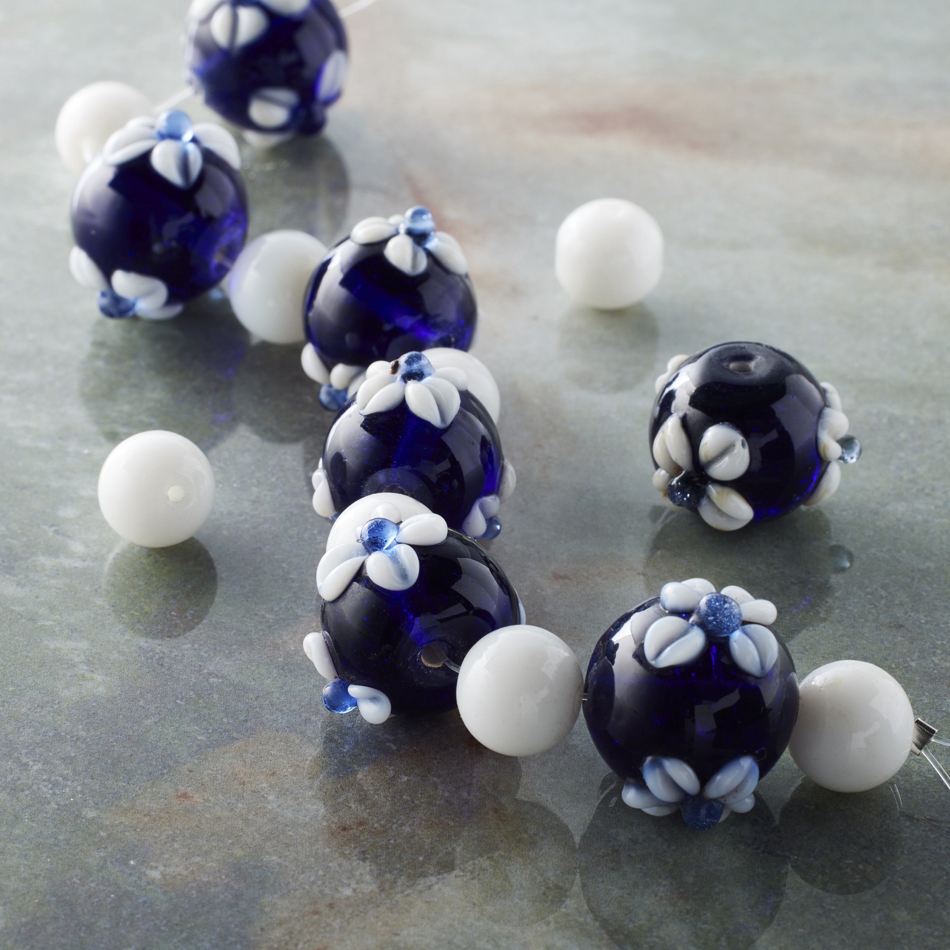 slide 2 of 3, Blue & White Lamp Work Glass Round Beads By Bead Landing, 7 in