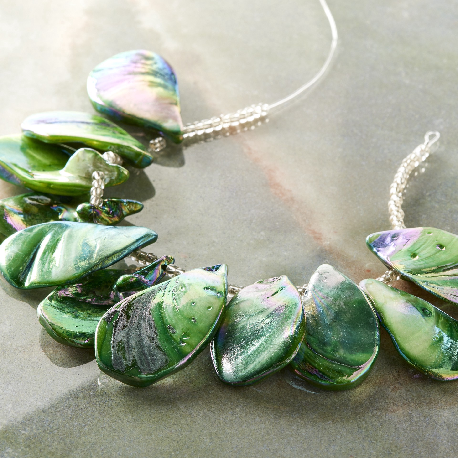 slide 3 of 3, Green Aurora Borealis Shell Teardrop Beads, 32mm By Bead Landing, 32 mm