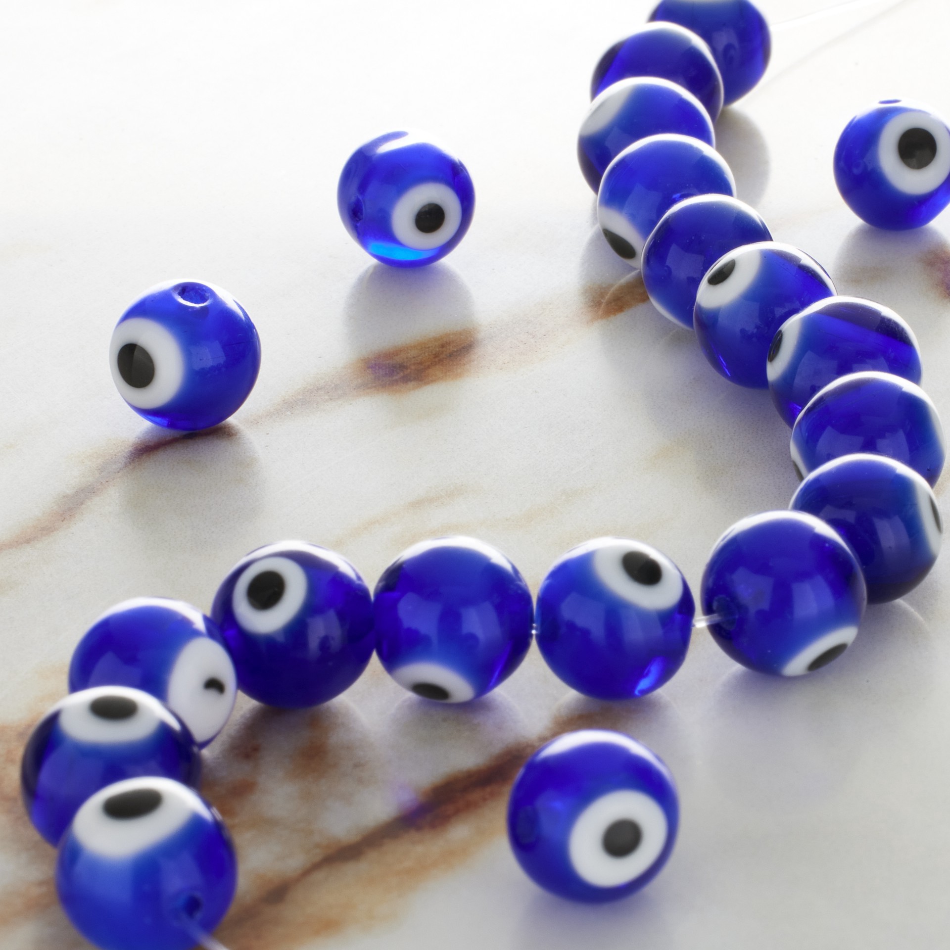 slide 2 of 3, Blue Glass Round Beads By Bead Landing, 10 mm