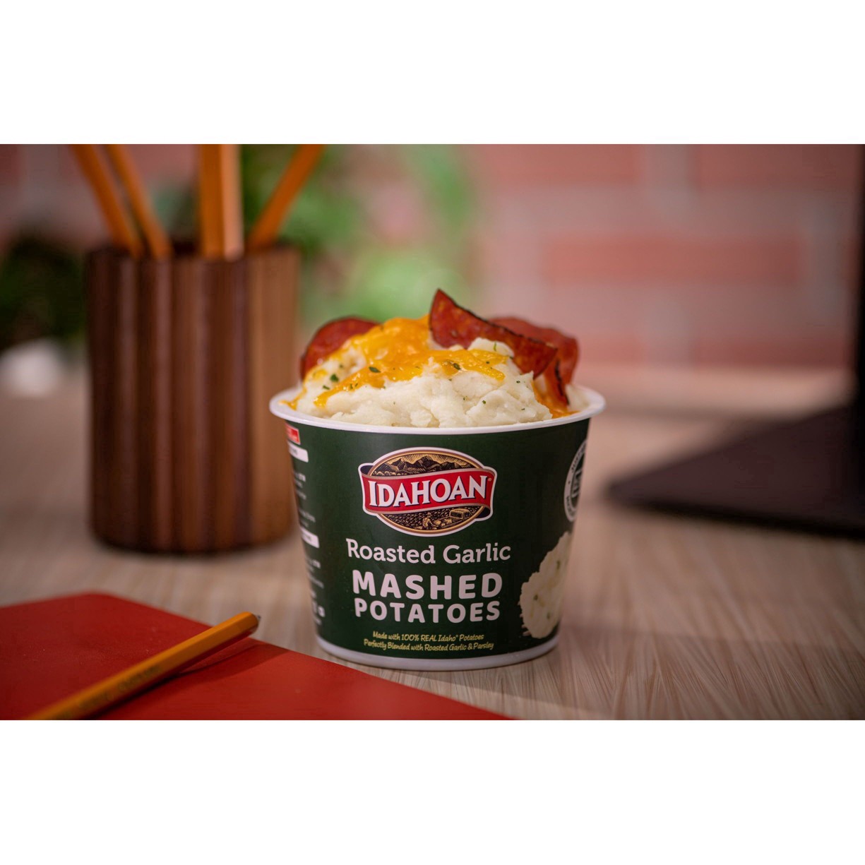 slide 8 of 17, Idahoan Roasted Garlic Mashed Potatoes Cup, 1.5 oz