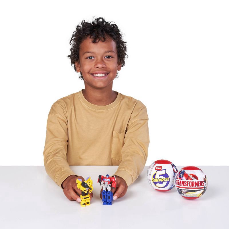 slide 5 of 9, 5 Surprise Transformers Series 1 Capsule, 1 capsule