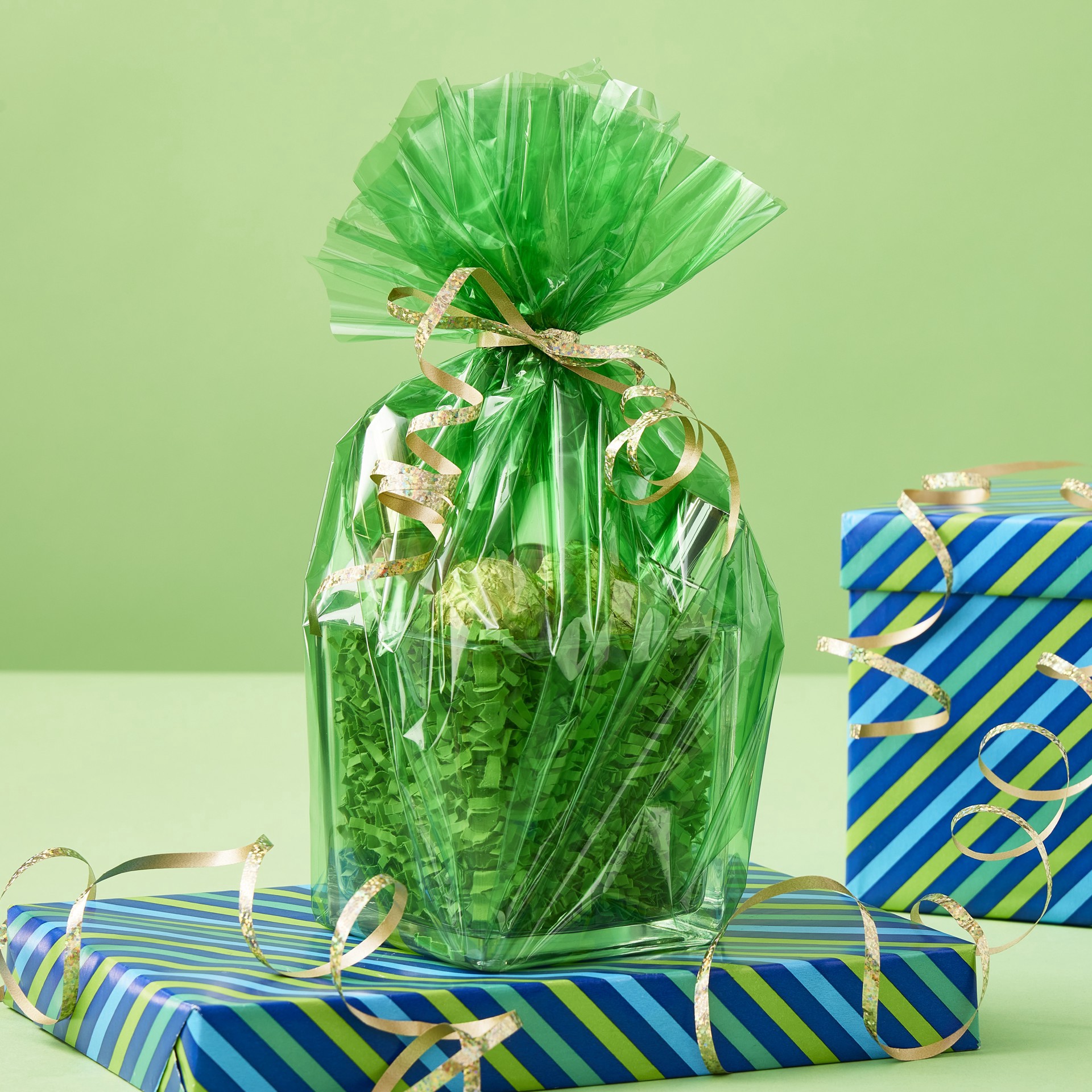 slide 2 of 3, Transparent Packaging Wrap By Celebrate It, 30 in x 25 ft