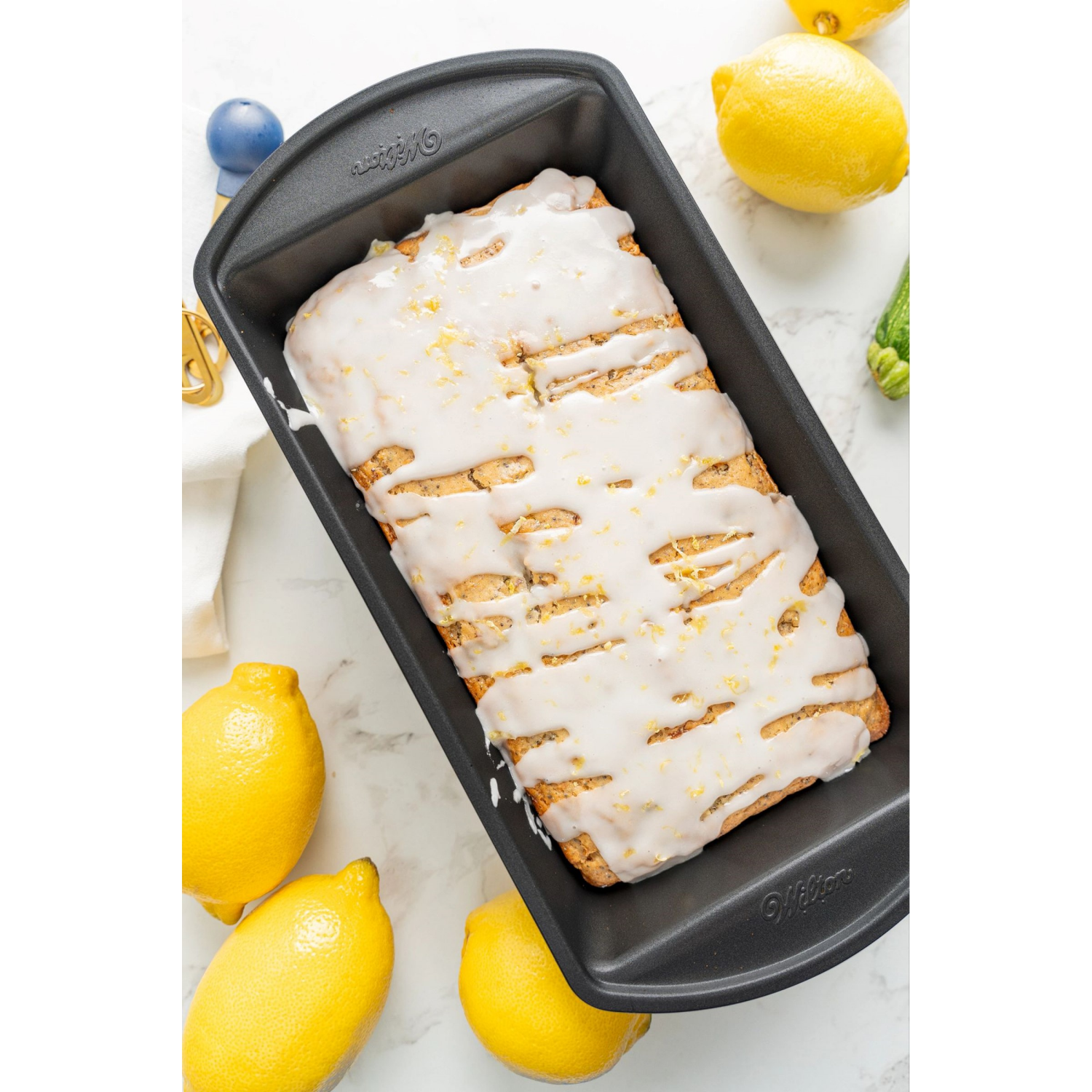 slide 3 of 3, Wilton™ Gold Non-Stick Loaf Pan Large, 9.25 x 5.25 