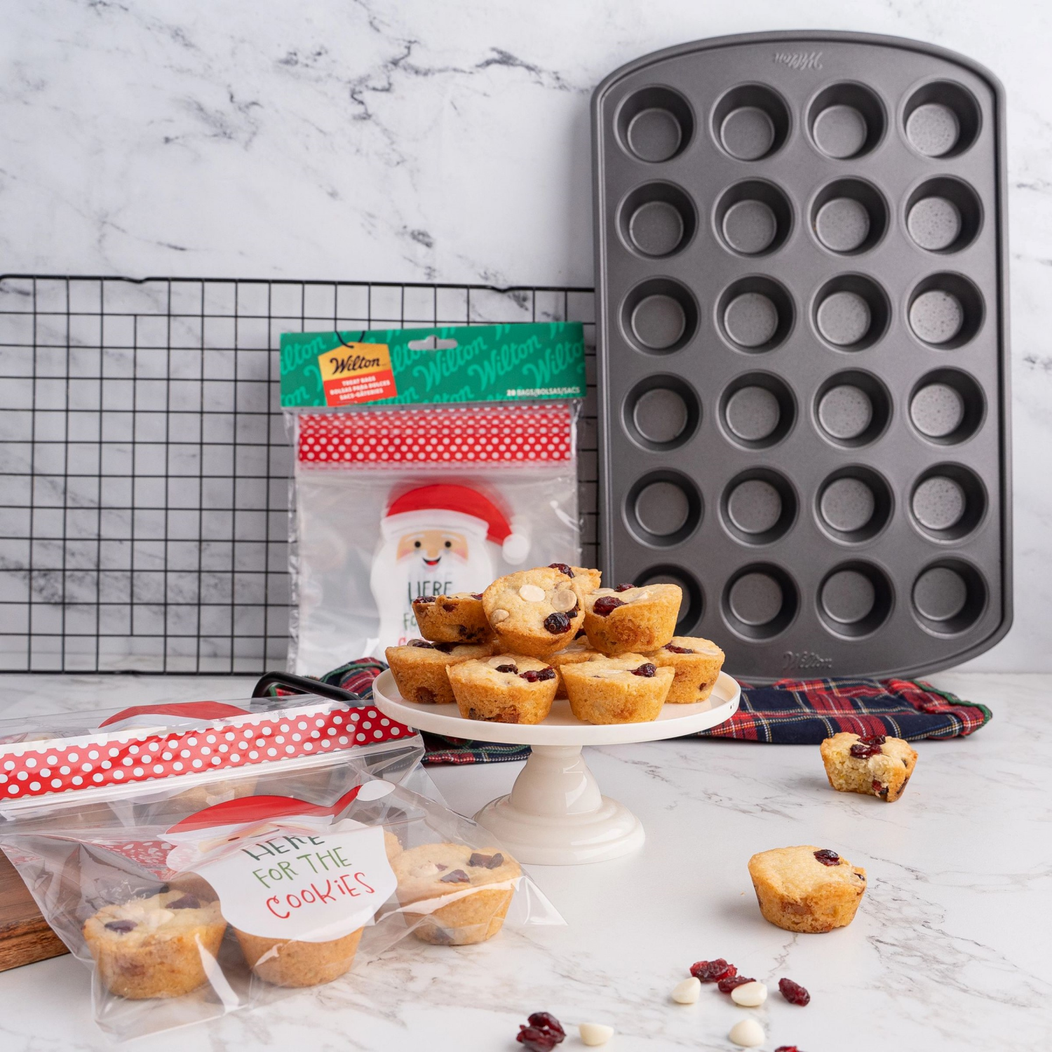 slide 2 of 3, Wilton™ Gold Non-Stick Muffin Pan Mini, 16 x 10 in