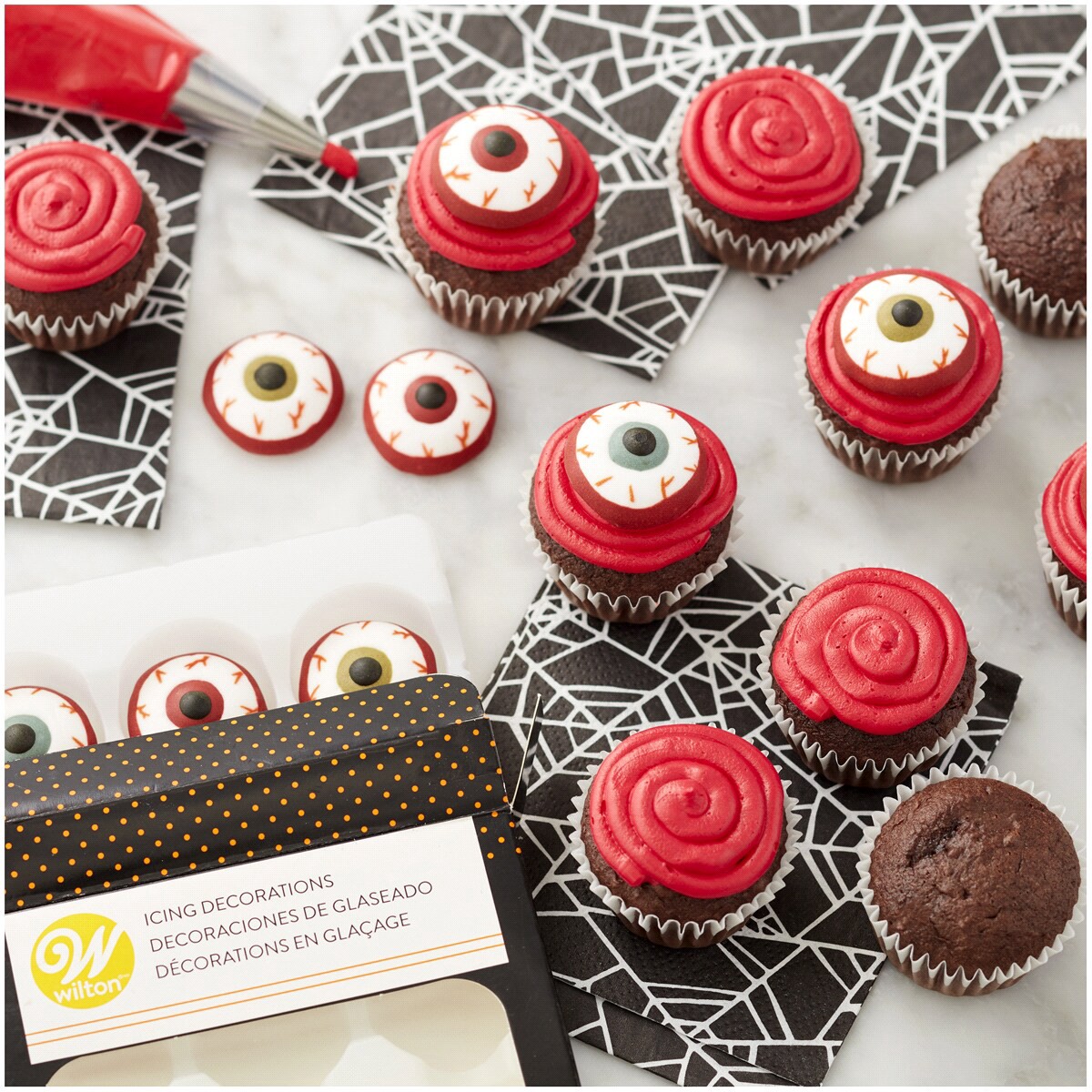 slide 2 of 3, Wilton Bloody Eyeball Icing Decorations, 12 ct