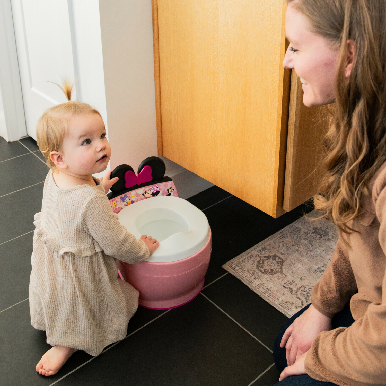 slide 2 of 4, The First Years Disney Minnie Mouse 2-in-1 Potty & Toddler Toilet Seat, One Size